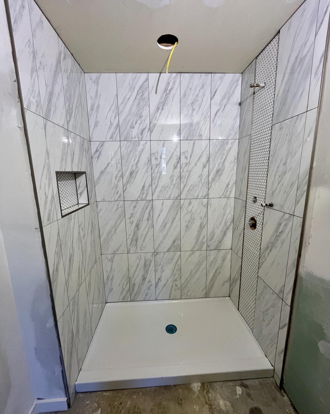 Marble tile shower remodel Portsmouth VA — bathroom renovation by Trinity Contracting Hampton Roads